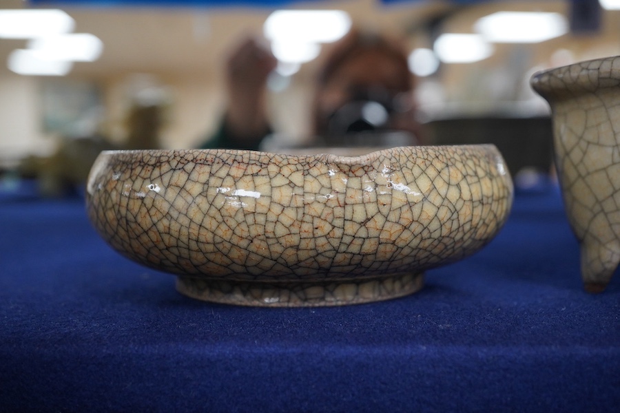 A Chinese crackle-glaze censer, 14cm wide, and a similar peach shaped brush washer, 12cm diameter (2). Condition - good.